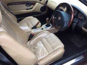 Bacchus cream leather interior with wood steering wheel at MGFnTFBITZ