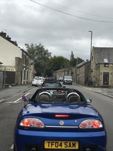 93.MGFs & MG TFs driving through Glossop Derbyshire for 2018 Topless Around The Peak District Charity Run raising money for UK Homes 4 Heroes with MGFnTFBITZ