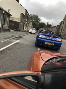 94.MGFs & MG TFs driving through Glossop Derbyshire for 2018 Topless Around The Peak District Charity Run raising money for UK Homes 4 Heroes with MGFnTFBITZ